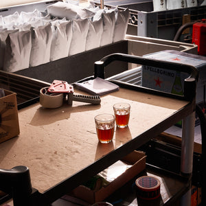 Altura Coffee warehouse photo with sanpellegrino carton  