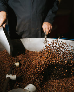 roasted coffee beans in roaster